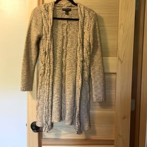 32 inches in length. 55% acrylic and 41% wool.